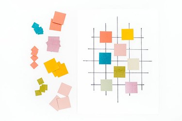 Lay out your paint chips on the gridded card stock until you\'re satisfied with the design.