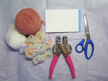 What you need to make a pompom bookmark.