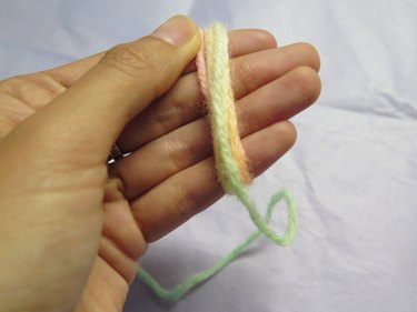 Wrapping the yarn.