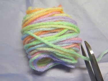 The yarn slipped off of the fingers.