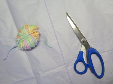 Cut a 15-in piece of yarn.