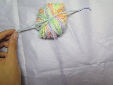 Add the tail to the yarn bundle.